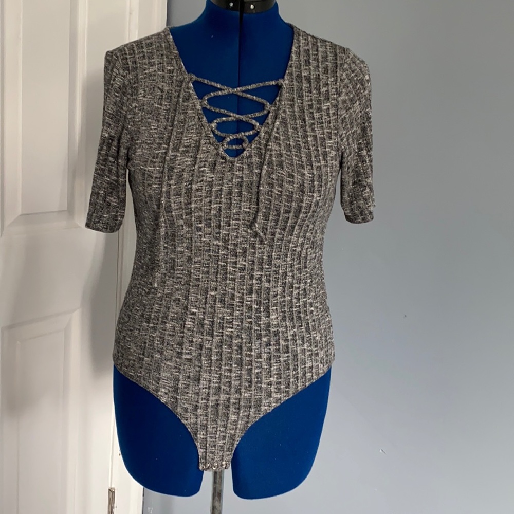 Grey bodysuit knitted look style.